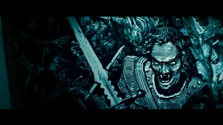 HD PC desktop wallpaper featuring a dark, intense scene from the movie Underworld: Rise of the Lycans with a snarling armored figure and gothic elements.