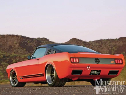 HD PC desktop wallpaper featuring a vibrant red Ford Mustang parked on a desert road with hills in the background.