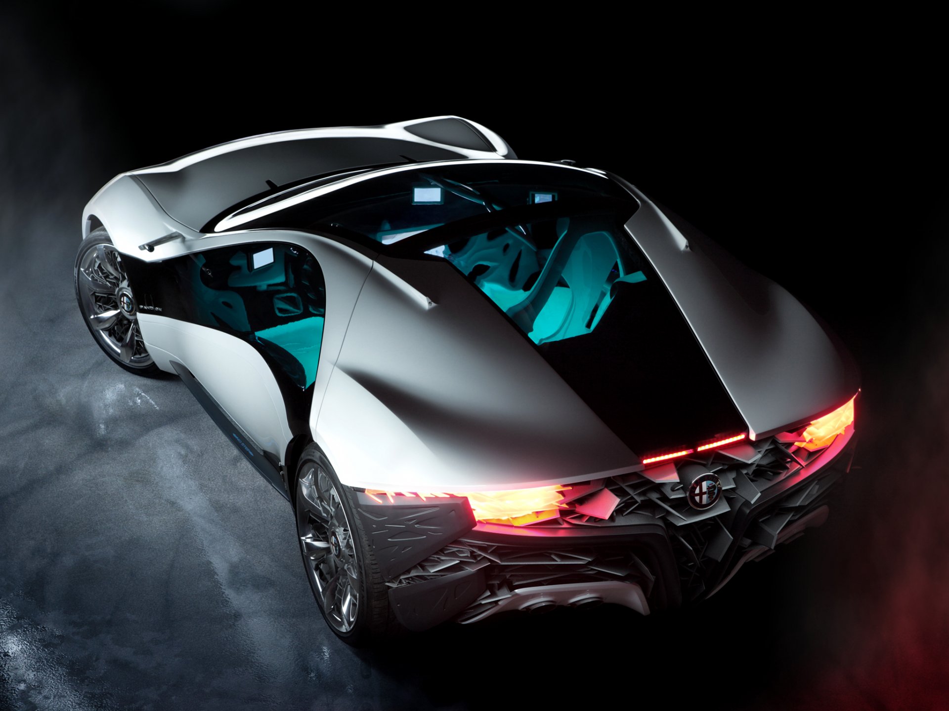 HD PC desktop wallpaper of a sleek silver Alfa Romeo Pandion vehicle, rear three-quarter view with glowing taillights and a cyan-lit cockpit against a dark background.