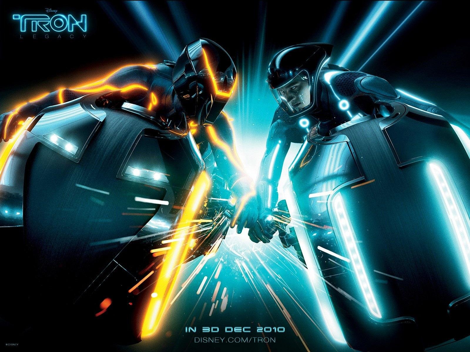 HD PC desktop wallpaper featuring two futuristic characters from the movie TRON: Legacy, glowing with neon blue and orange lights in a dynamic action pose.
