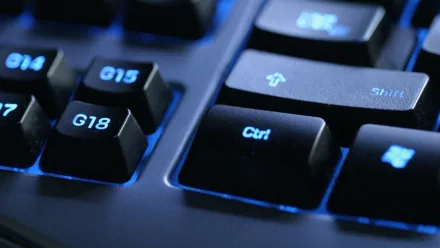 Close-up of a backlit keyboard showing keys labeled G15, G18, and Ctrl, showcasing modern technology, designed as HD PC desktop wallpaper and background.