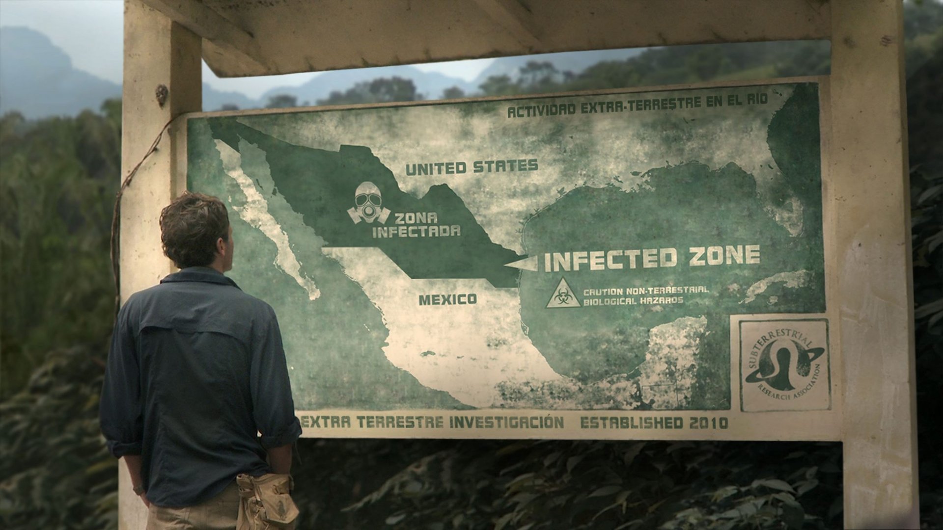 HD PC desktop wallpaper showing a person studying a map labeled Infected Zone in a suspenseful sci-fi thriller with adventure, horror, and monster themes.