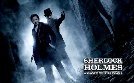 A high-definition desktop wallpaper featuring Sherlock Holmes and Dr. Watson from the movie Sherlock Holmes: A Game of Shadows, set against a mysterious, foggy backdrop.