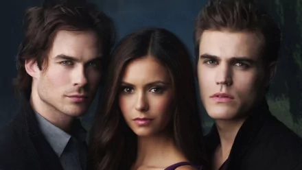 HD desktop wallpaper from the TV show The Vampire Diaries featuring close-up portraits of three main characters.
