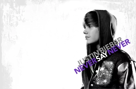 Black and white HD desktop wallpaper featuring Justin Bieber with the text Never Say Never in purple.