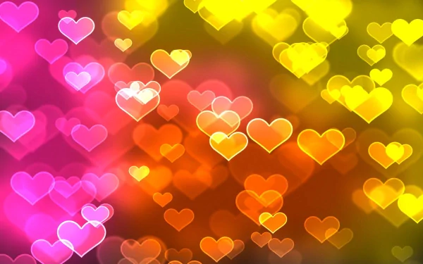 HD PC desktop wallpaper featuring a vibrant bokeh of pink, orange, and yellow heart shapes, evoking a festive Valentine's Day holiday mood.