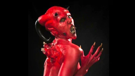 HD PC desktop wallpaper from the movie The Devil's Rock featuring a red-skinned demonic figure with horns and an open mouth against a black background.