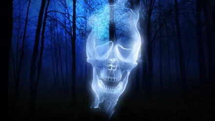 A ghostly skull hovers in a dark forest, enveloped by an eerie blue mist. This spooky HD wallpaper captures the haunting spirit of Halloween.