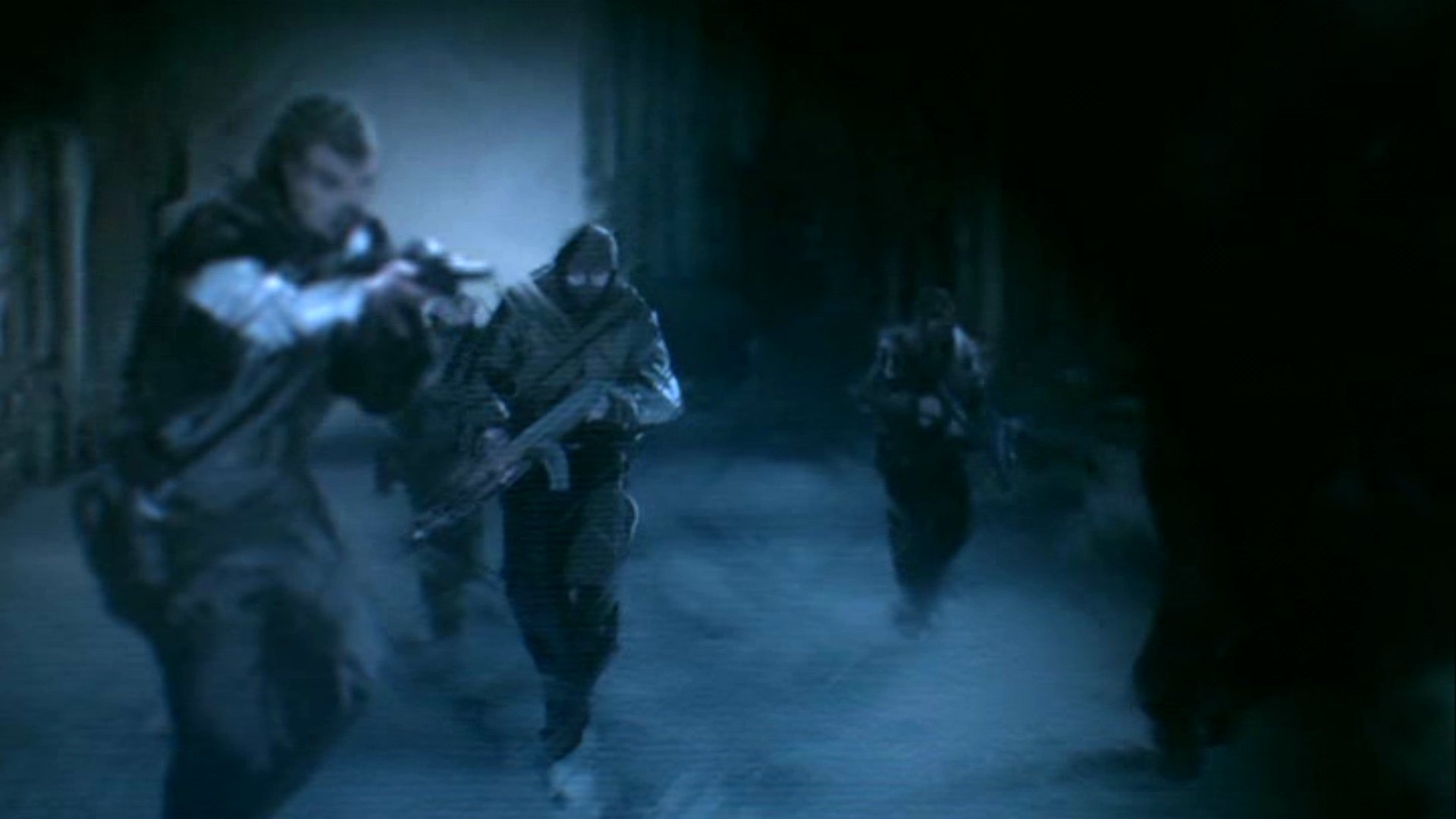 HD PC desktop wallpaper from the movie Resident Evil: Damnation: armed operatives run through a foggy, dim corridor with weapons raised in a tense action scene.
