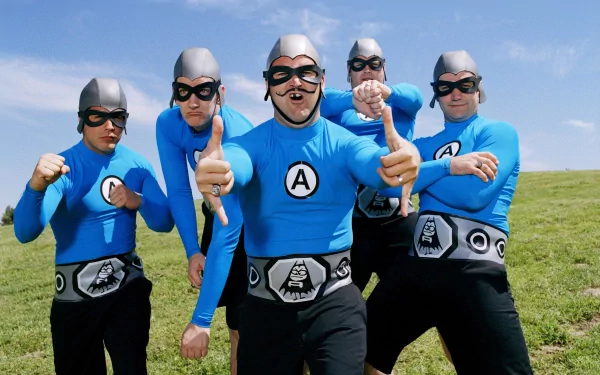 2K Quad HD PC wallpaper of five costumed musicians in blue superhero suits posing on a grassy hill, music-themed, tagged the aquabats