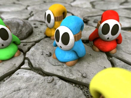 HD desktop wallpaper featuring colorful Shy Guy characters from the Super Mario video game series standing on a cracked, stony ground.
