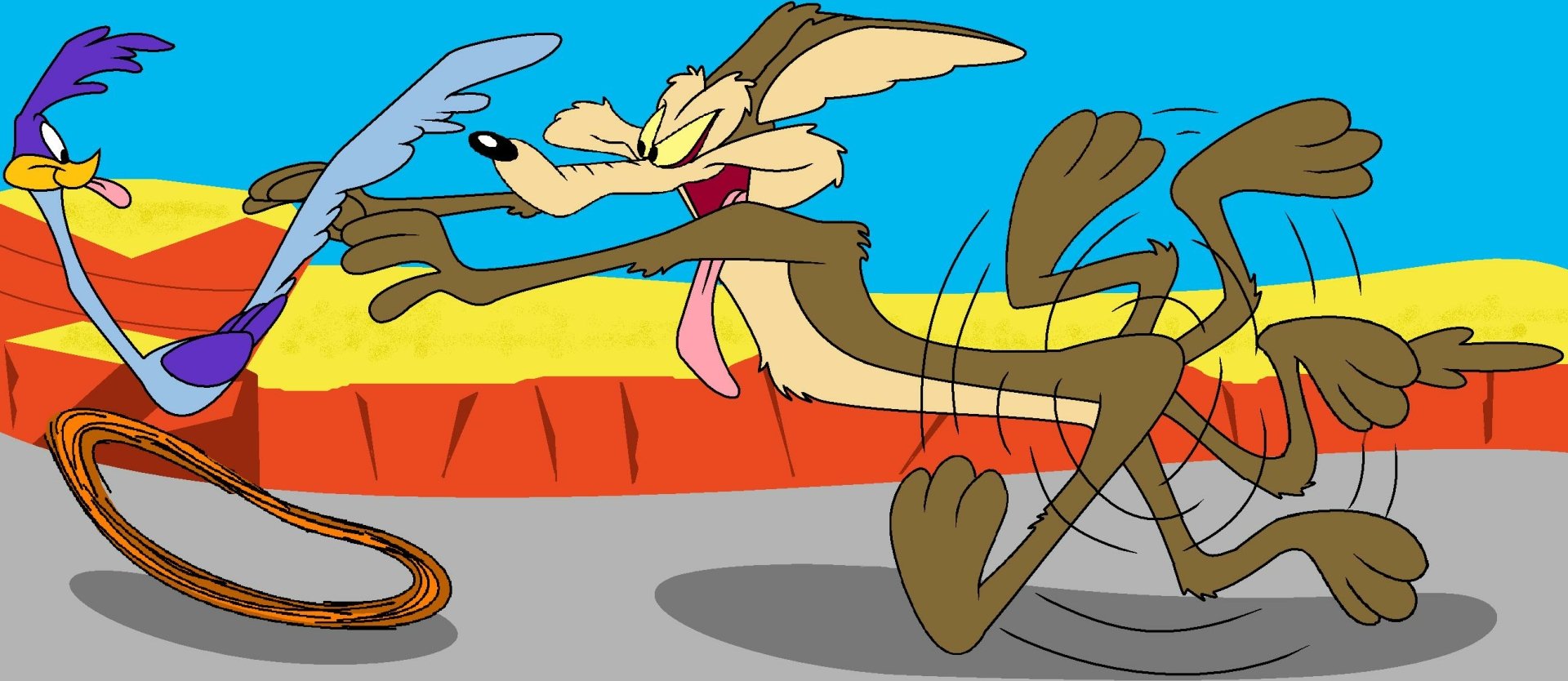 HD desktop wallpaper featuring the coyote from the Looney Tunes TV show, depicted in a vibrant desert scene with dynamic motion and bright colors.