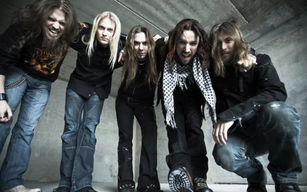 HD PC desktop wallpaper featuring the band Sonata Arctica posing energetically in an industrial setting, capturing their music-driven intensity and style.