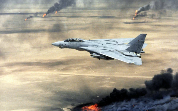 HD PC desktop wallpaper showing a military aircraft flying over burning oil fields during the Gulf War, with thick black smoke rising against a desert backdrop.