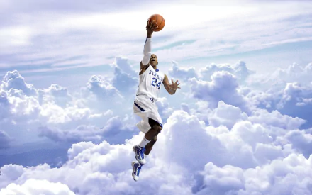 A player from the Kentucky Wildcats leaps through clouds, basketball in hand, showcasing a dynamic sports moment in this HD desktop wallpaper background.