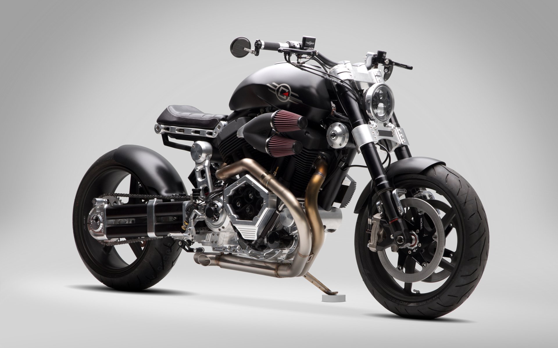 HD desktop wallpaper featuring a sleek black Confederate Motors motorcycle against a clean gray background, highlighting its modern design and powerful build.