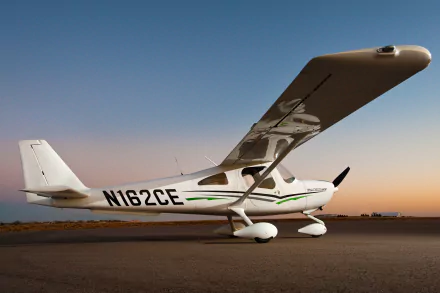 Cessna light aircraft (vehicle) N162CE parked on a runway at sunset, side view — 5K Ultra HD PC desktop wallpaper background