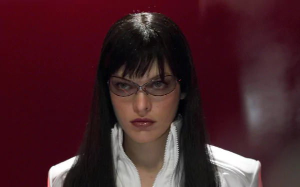 HD PC desktop wallpaper featuring Milla Jovovich as her character from the movie Ultraviolet, set against a dark red background.
