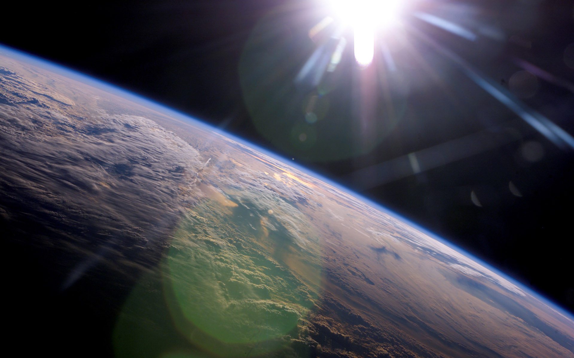 Stunning HD Earth View from Space Wallpaper with Sunlight by patrika