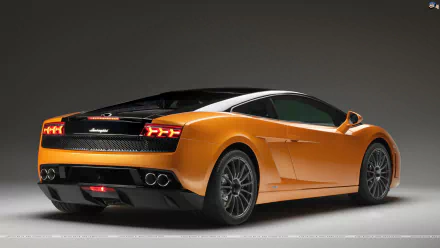 HD PC desktop wallpaper showing an orange Lamborghini Gallardo vehicle, rear three-quarter view against a neutral gray background.