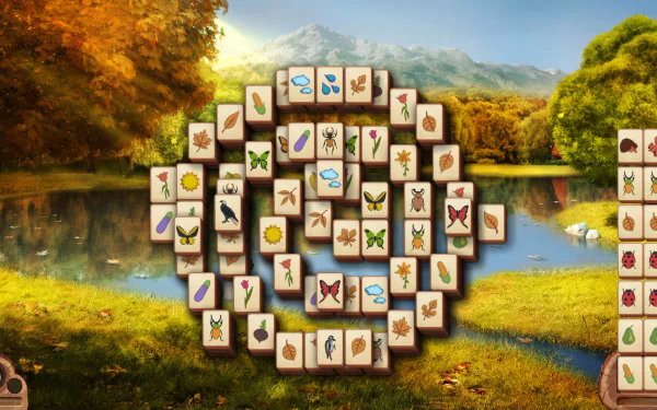 HD PC desktop wallpaper featuring a man-made Mahjong tile arrangement set against a serene autumn lake and mountain landscape.