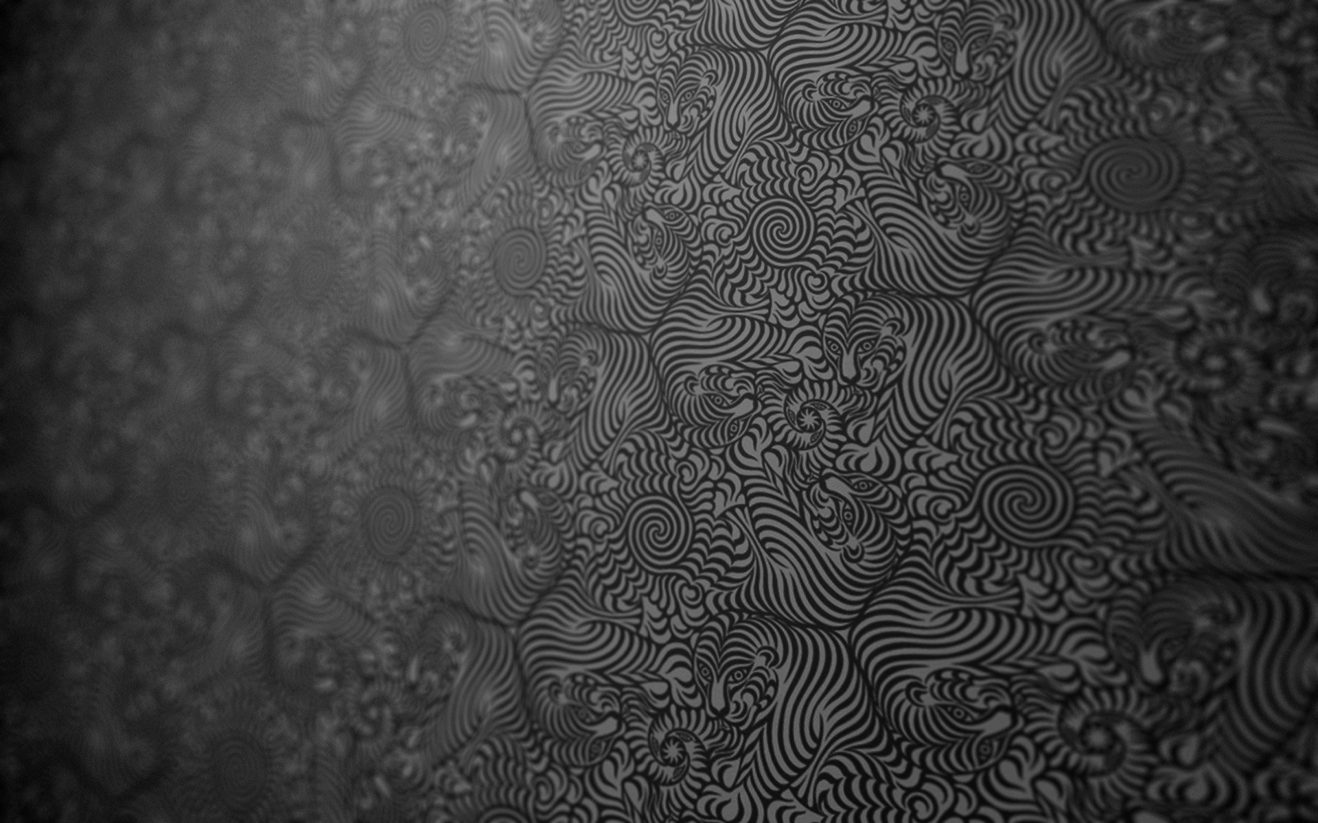 A textured black and white abstract pattern featuring swirling designs, creating a dynamic visual depth. This HD image serves as an engaging desktop wallpaper and background.