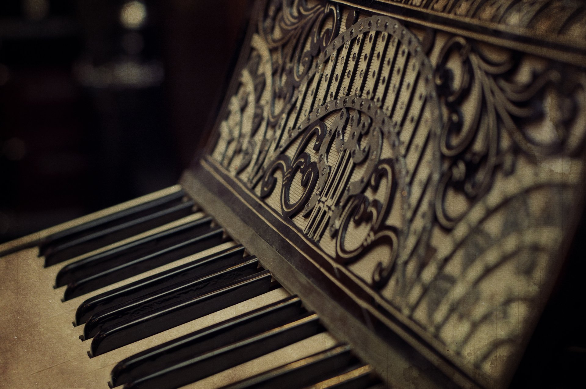 HD PC desktop wallpaper featuring a close-up of an ornate piano keyboard and music stand with intricate carvings, highlighting music and piano themes.