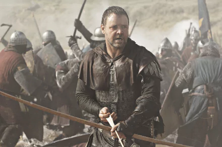 Russell Crowe as Robin Hood in a battle scene from the 2010 movie Robin Hood, presented as a 4K Ultra HD PC desktop wallpaper and background.