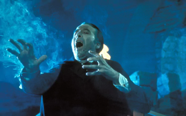 HD PC desktop wallpaper featuring a dramatic scene from the movie Scars of Dracula, showcasing intense lighting and a startled character in a dark, eerie setting.