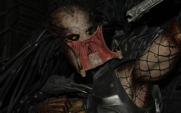 Close-up of a Predator alien in detailed armor, rendered in 4K Ultra HD as a sci-fi PC desktop wallpaper and background.