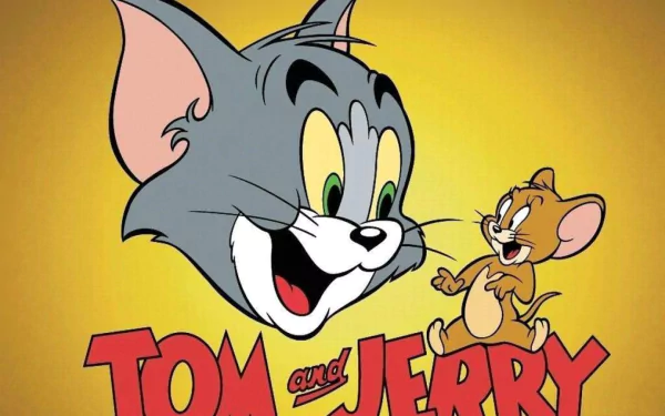 HD desktop wallpaper featuring the TV show Tom and Jerry with Tom the cat and Jerry the mouse, smiling on a bright yellow background.