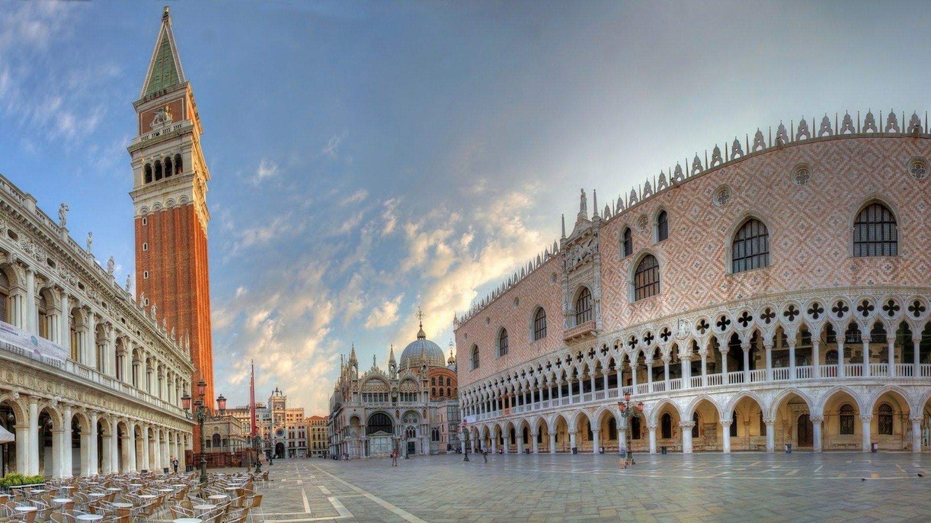 HD PC desktop wallpaper/background: panoramic man-made Venice view of St. Mark's Square with the Campanile, Doge's Palace and St. Mark's Basilica beneath a glowing sky.