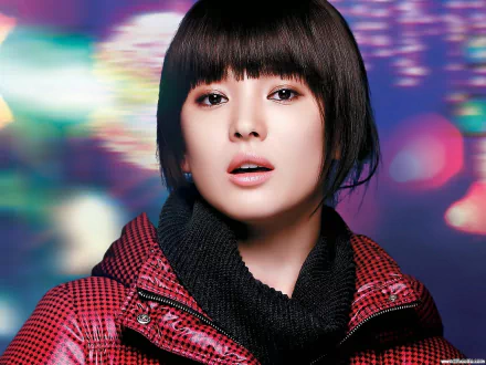 HD desktop wallpaper featuring Korean celebrity Song Hye Kyo, showcasing her captivating expression against a colorful abstract background.