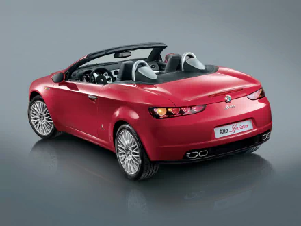 HD desktop wallpaper featuring a red Alfa Romeo Brera Spider convertible, showcasing its sleek design and sporty rear view.