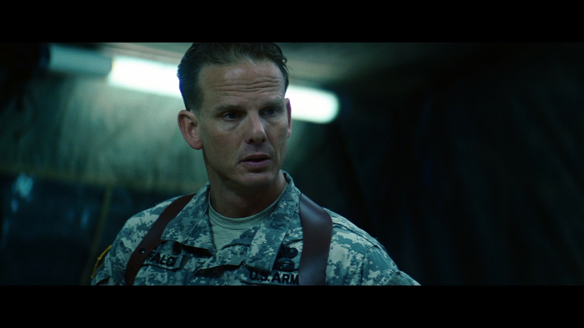 Close-up of a stern U.S. Army officer in a dim tent from the movie Lions for Lambs — HD PC desktop wallpaper/background.