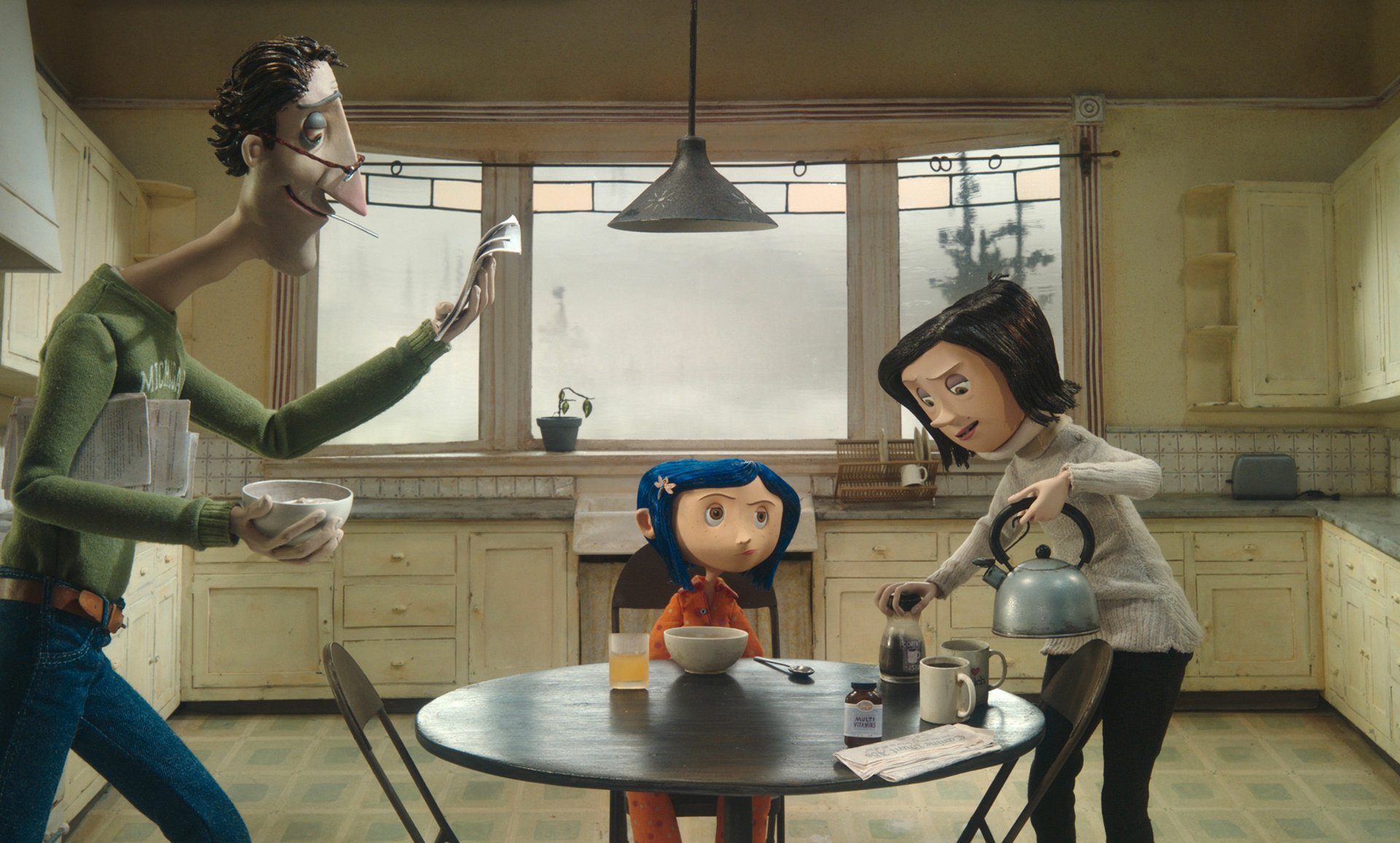 HD PC desktop wallpaper featuring a scene from the movie Coraline, showing Coraline with two adults in a cozy kitchen setting.