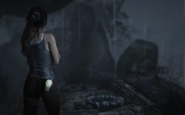 A striking CGI image of Lara Croft from Tomb Raider, set in a dark, rain-soaked environment, showcasing her adventurous spirit in this HD PC desktop wallpaper.