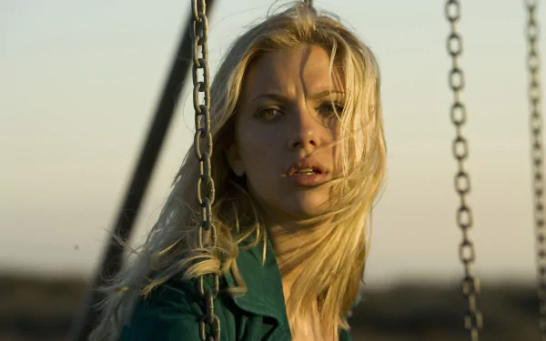 I can’t identify people in images. Alt: Cinematic close-up of a blonde woman on a swing from the movie The Island, 2K Quad HD PC desktop wallpaper.