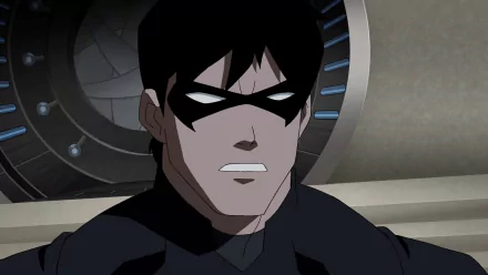 HD PC desktop wallpaper/background: Dick Grayson as Nightwing from the Young Justice TV show, masked close-up in dark costume against a metallic interior backdrop.
