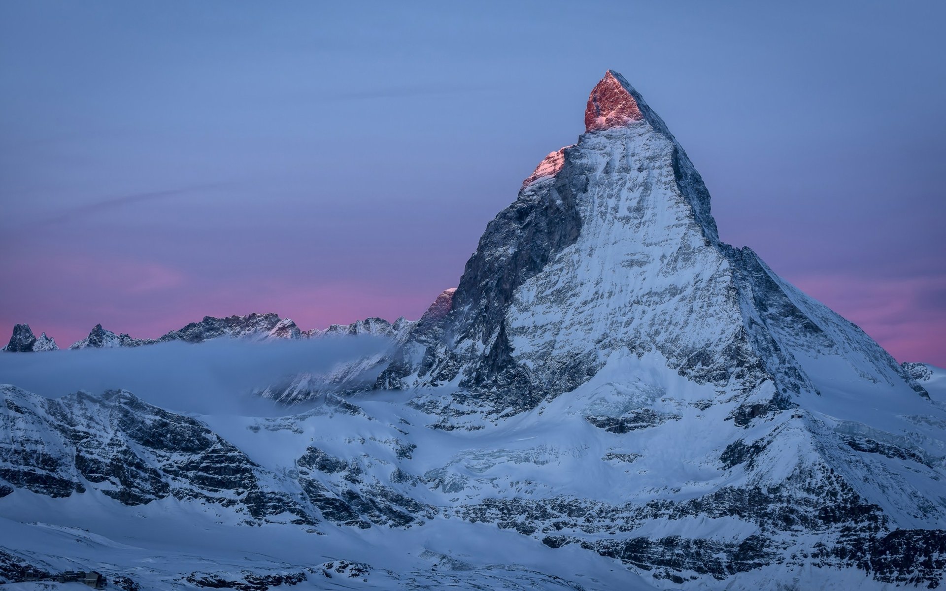 Nature, mountain 2K Quad HD PC desktop wallpaper: towering snow-covered peak bathed in pink-purple twilight sky above rugged glacier fields.