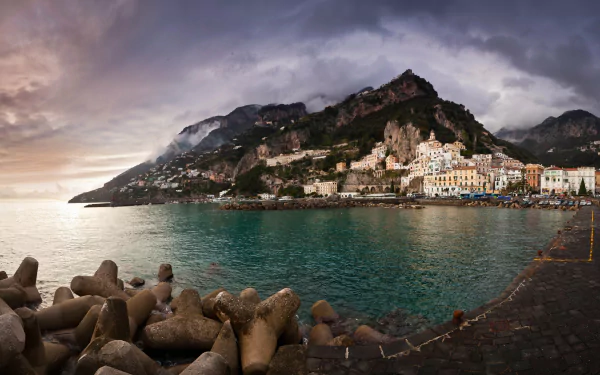 Breathtaking Amalfi Coast desktop wallpaper featuring stunning man-made structures harmonizing with the coastal beauty.