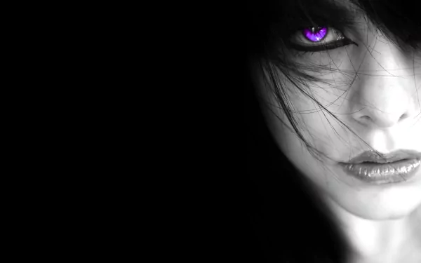 HD desktop wallpaper featuring a striking monochrome close-up of a woman with intense, vividly purple eyes, her face partly obscured by dark hair, set against a deep black background.