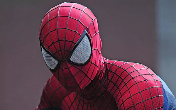 HD desktop wallpaper featuring Spider-Man from the movie The Amazing Spider-Man 2 in his iconic red and blue suit with white eye lenses against a neutral background.