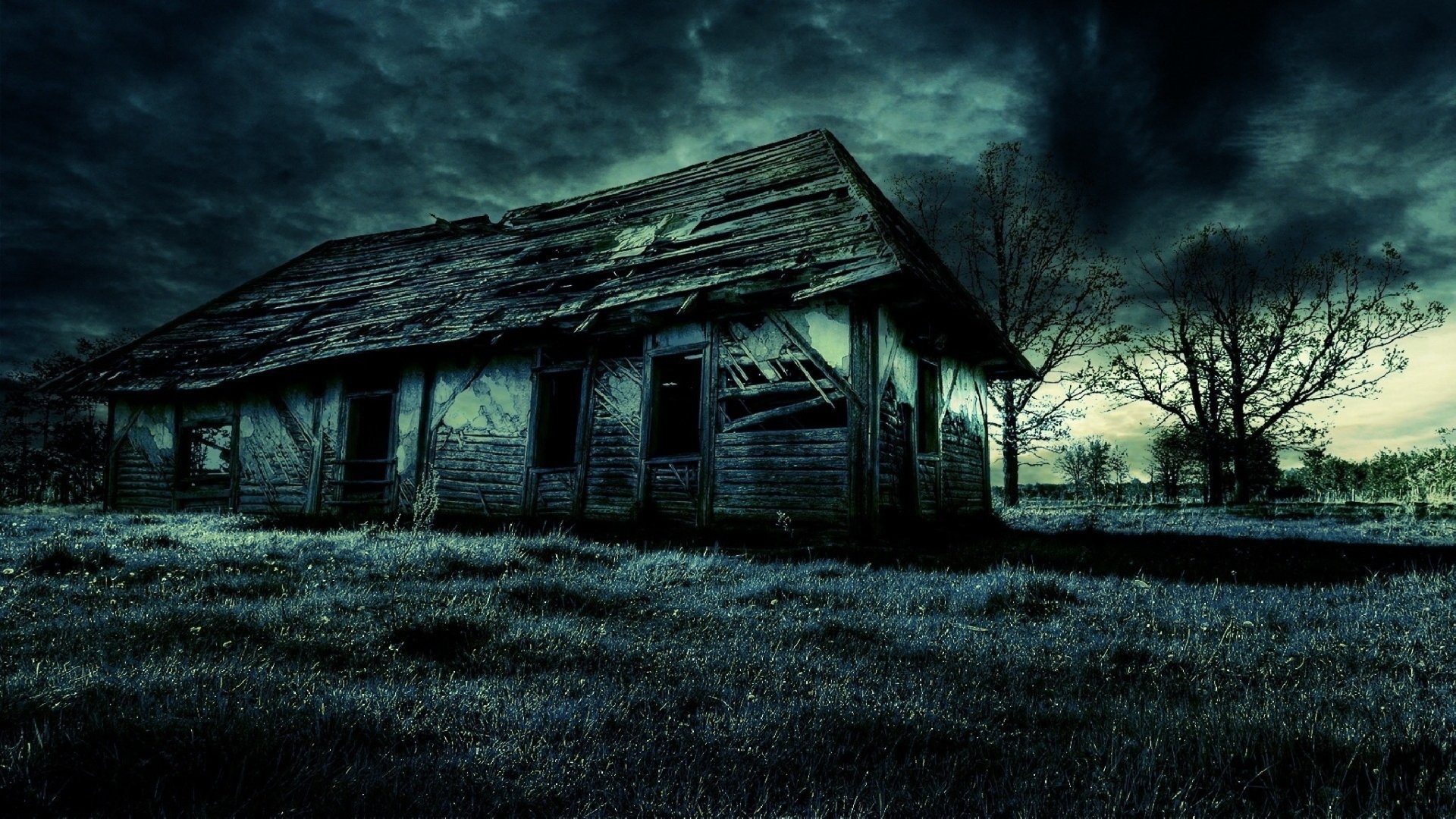A dark, eerie ruin of a man-made house set against a stormy sky, captured in HD for a dramatic PC desktop wallpaper and background.