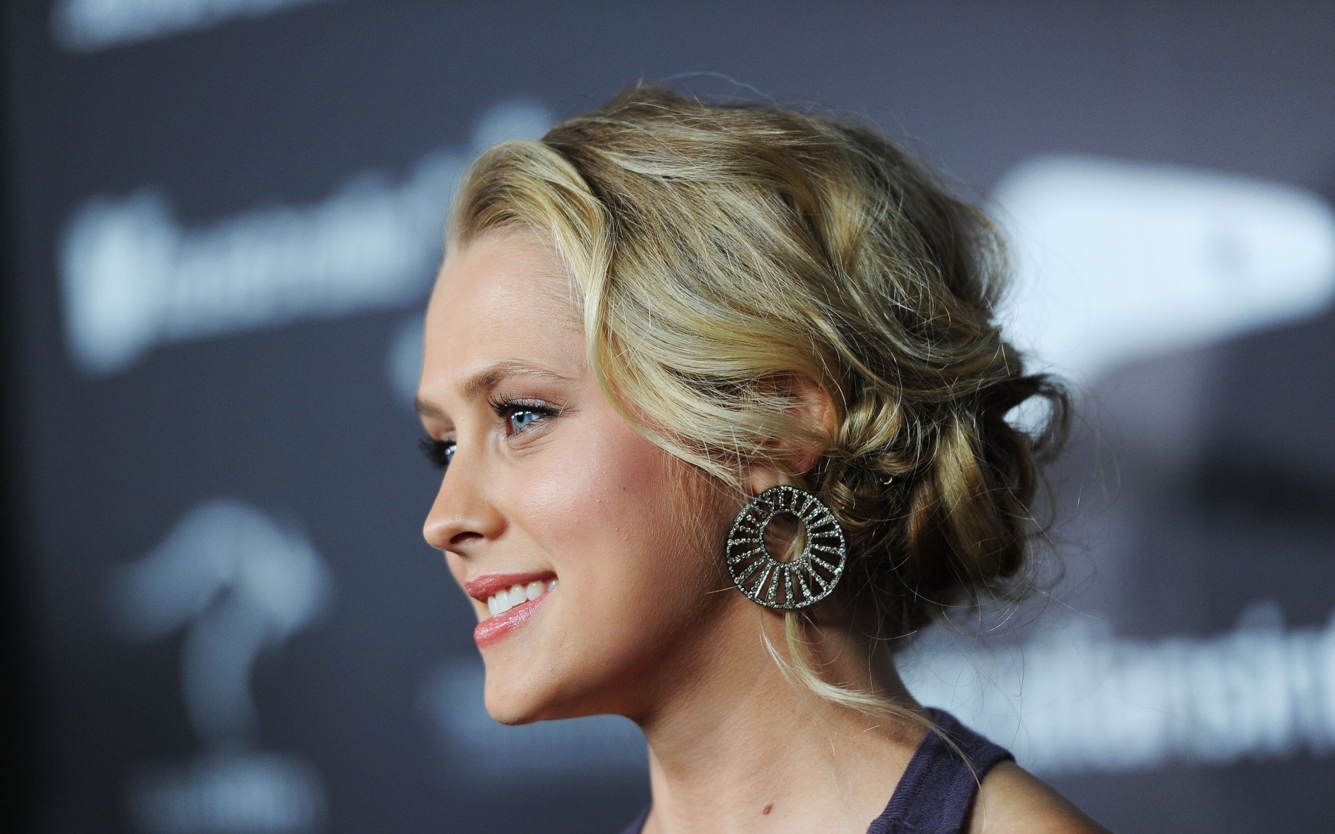 HD desktop wallpaper featuring Australian actress and celebrity Teresa Palmer smiling in profile at a formal event.