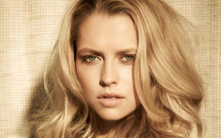A striking HD wallpaper featuring Australian actress Teresa Palmer, showcasing her captivating beauty and expressive gaze against a textured background.
