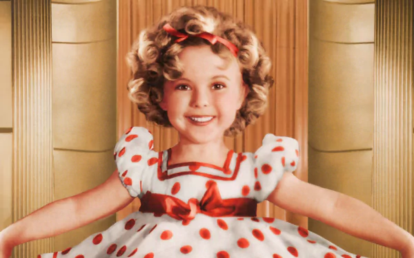 HD PC desktop wallpaper featuring a classic portrait of Shirley Temple in a polka-dot dress with a red bow, smiling against a vintage backdrop.