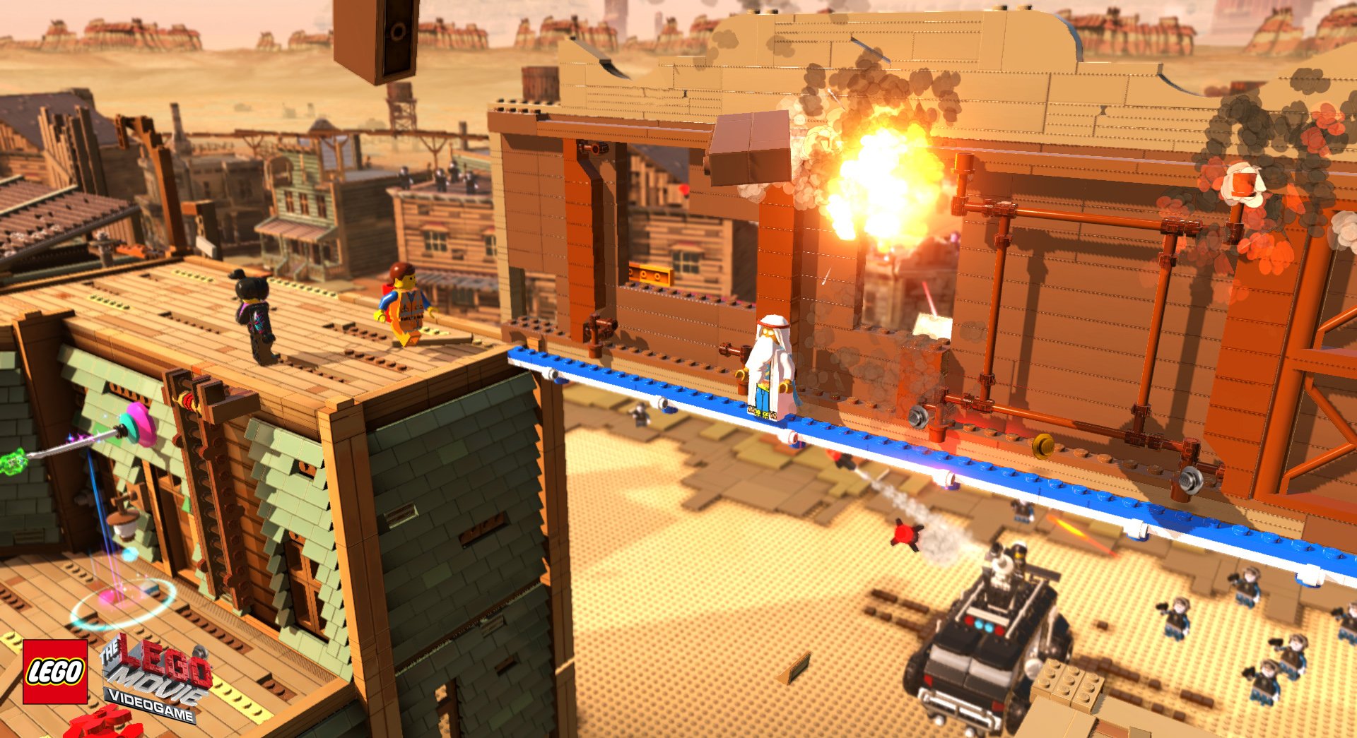 HD PC desktop wallpaper featuring LEGO Movie characters Emmet, Wyldstyle, Vitruvius, and a cop robot in a desert video game setting from The LEGO Movie - Videogame.