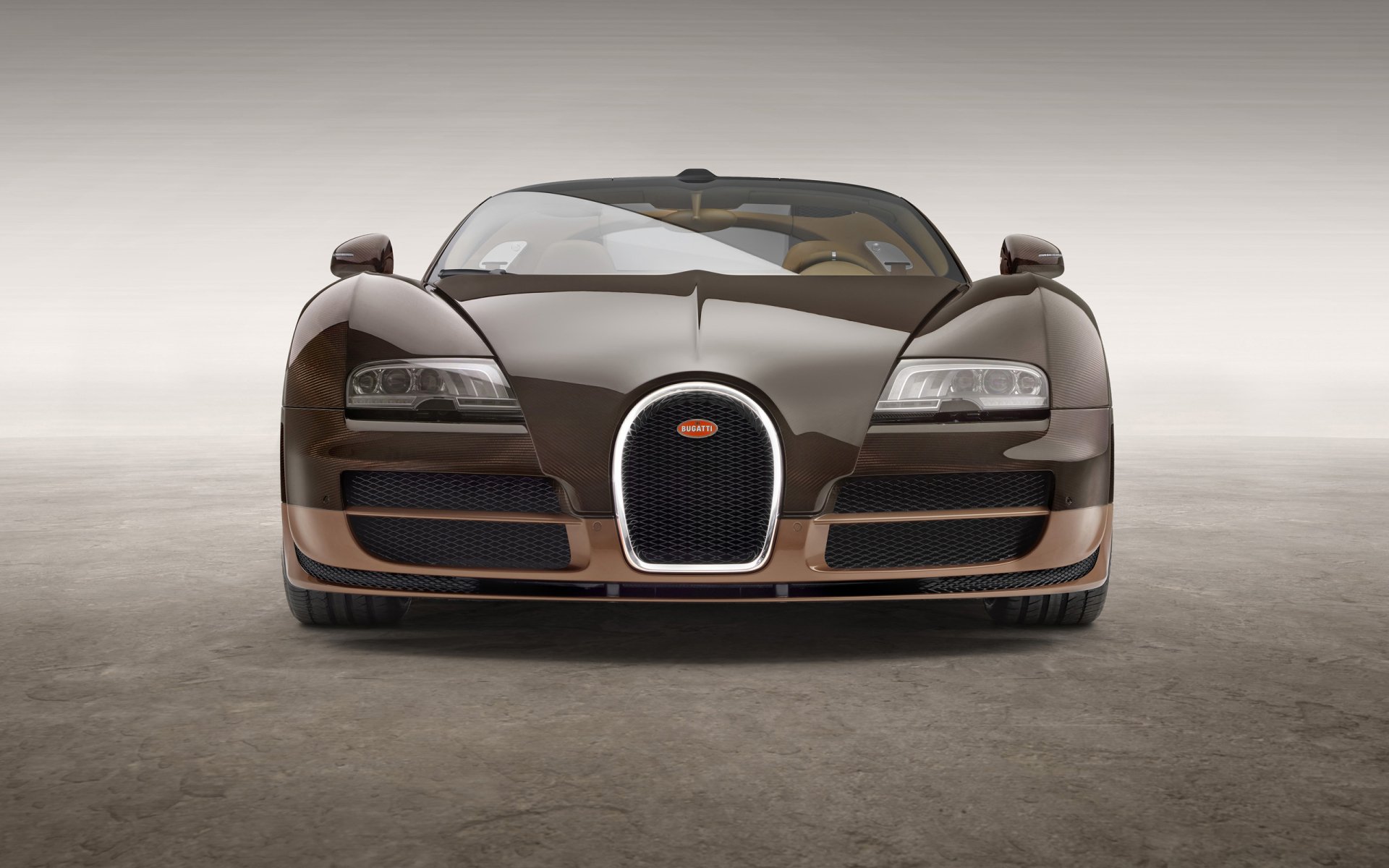 HD desktop wallpaper featuring a brown Bugatti Veyron Grand Sport Vitesse viewed from the front against a minimalist neutral background.