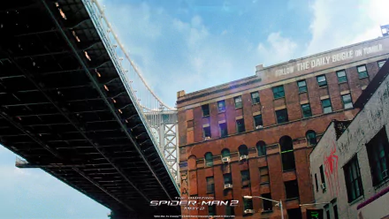 HD desktop wallpaper and background scene from the movie The Amazing Spider-Man 2, featuring a cityscape with a bridge and brick buildings on a clear day.